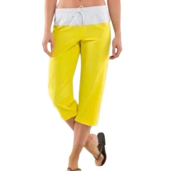 LULULEMON STEP LIVELY CROP PANTS IN YELLOW & WHITE - Picture 7 of 7